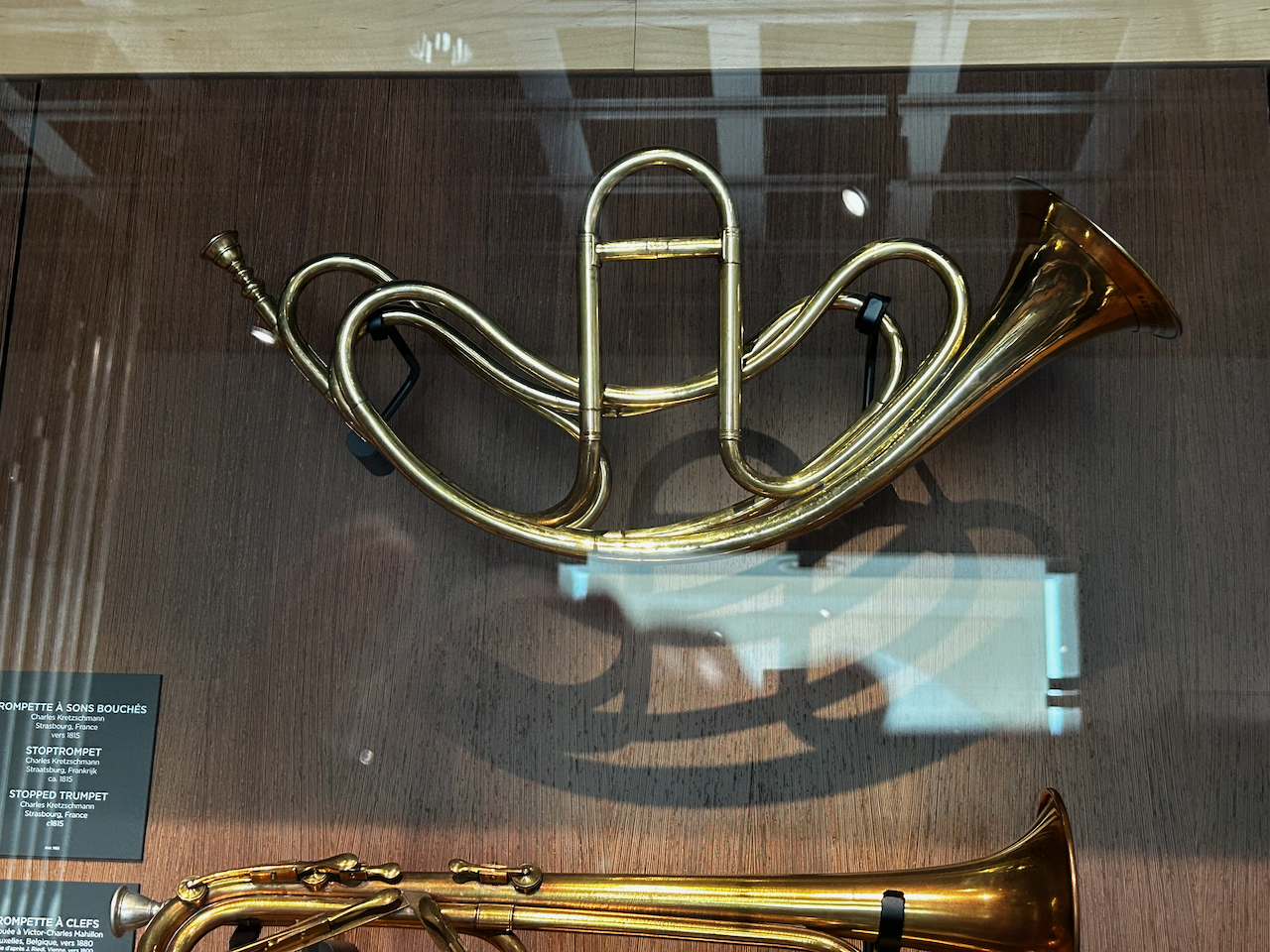 Photograph of (a) brass instrument(s) from the Musical Instruments Museum in Brussels, Belgium